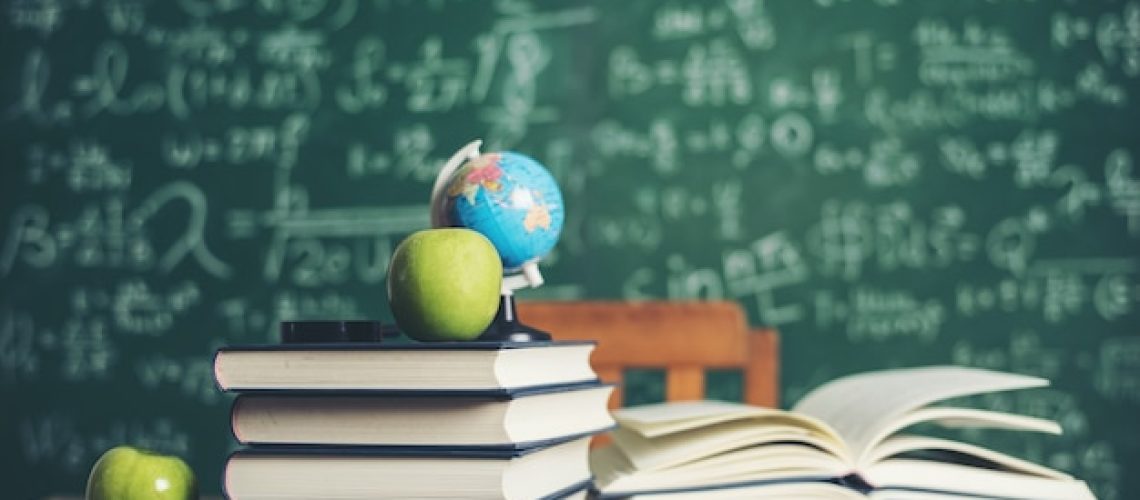 book-with-green-board-background_1150-3836